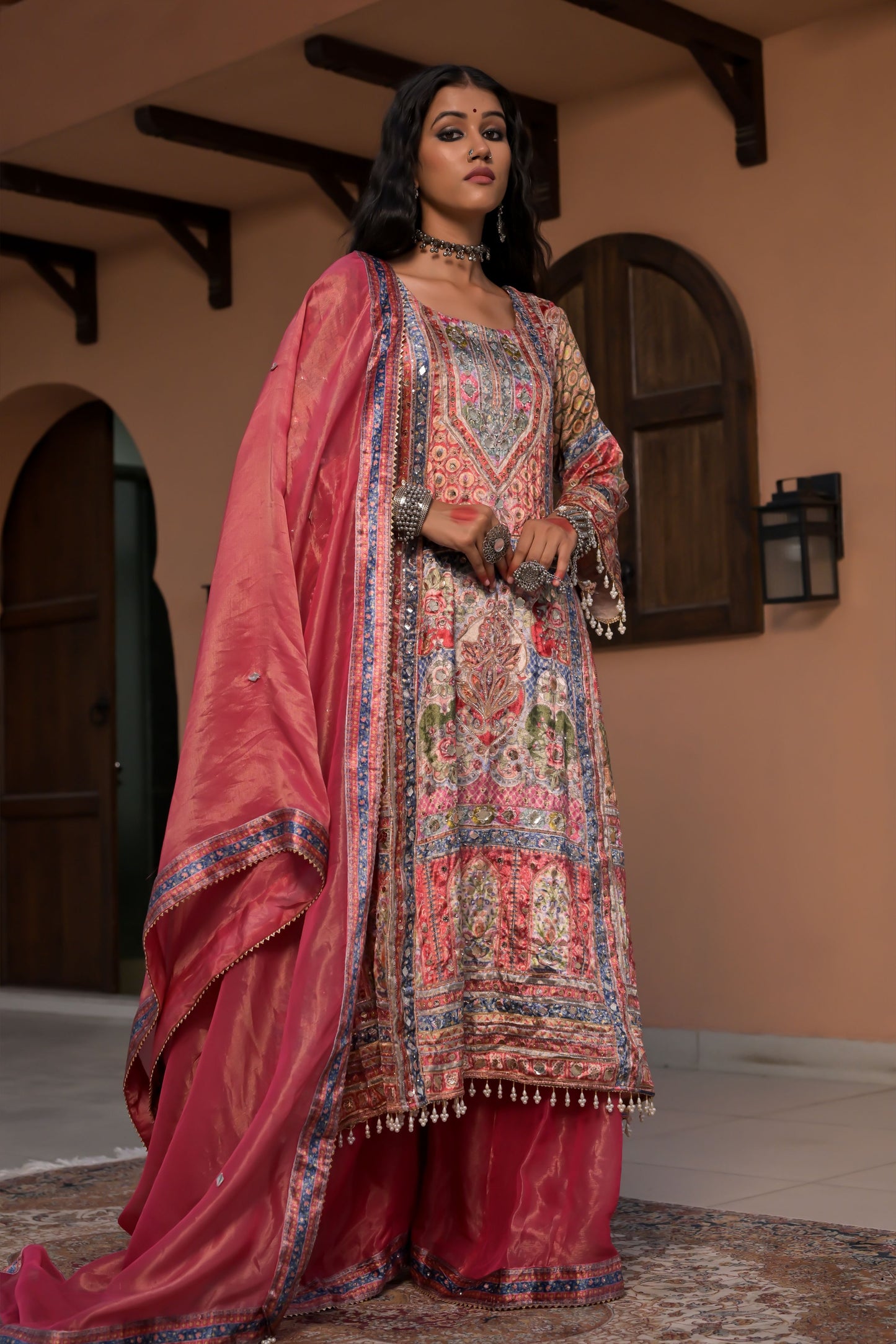 Dark Coral Printed Velvet Suit with Artistic Borders – Noor Radiance Edit